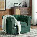 Fauteuil club pivotant capitonné Chesterfield